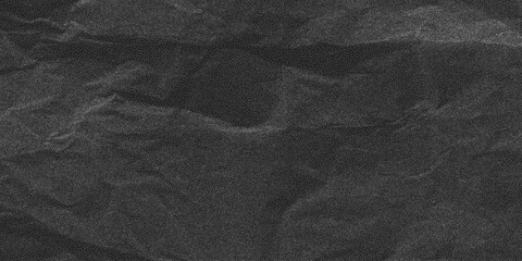 Distress overlay texture, dusty and gritty marks. Black crumpled paper surface with rough folds and subtle halftone noise, grunge backdrop.