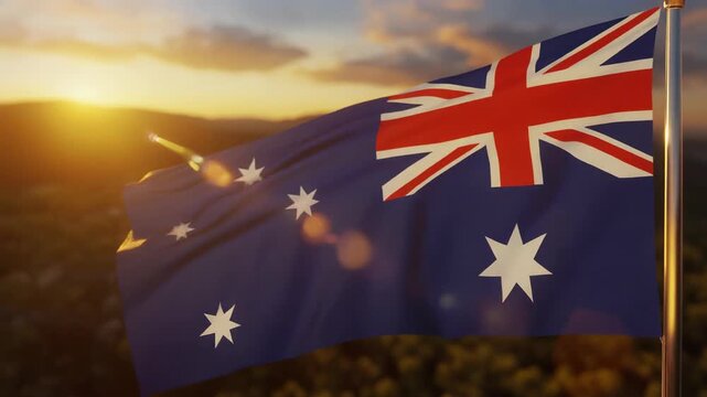 Australian flag proudly waves before stunning sunset. Suitable for patriotic designs, educational resources, travel promotions, and national celebrations visuals.