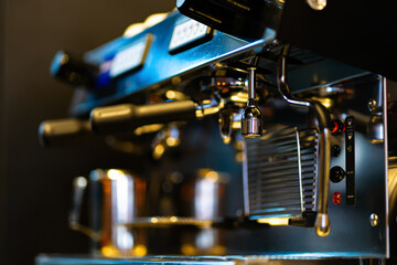 close-up image of the coffee machines that are operating automatical Coffee flowing into coffee cup that is prepar for service Coffee aroma bake the whole shop and the shop atmosphere that look warm