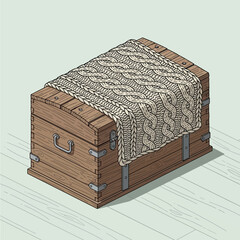 Vintage wooden chest with intricate cable-knit blanket draped over it in a minimalist style room