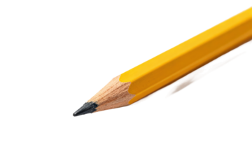 A close-up view of a sharpened yellow pencil tip