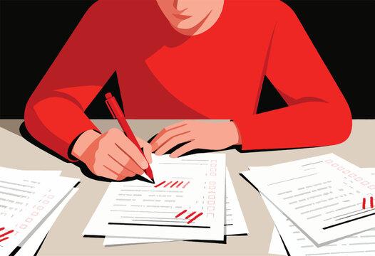 Person in red shirt grading papers with red pen