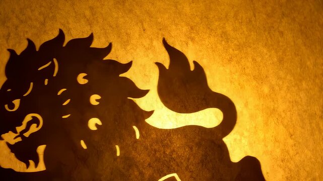 Chinese Lion Shadow Puppets Performing on Golden Paper Screen
