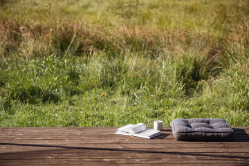 Cozy weekend retreat on a wooden patio surrounded by nature