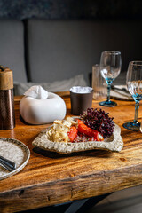 Gourmet stuffed peppers served in rustic restaurant setting