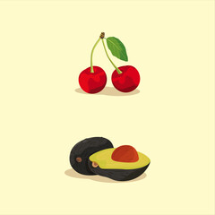Fresh ripe cherries and a whole avocado with one half showing the seed on a light background