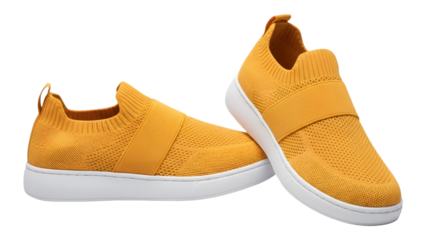 Vibrant yellow slip on shoes on transparent background