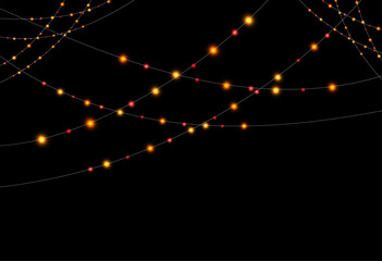 Multiple hanging Christmas garlands in champagne, orange, and red tones on a black background, with a large central garland and smaller side garlands creating a festive composition.