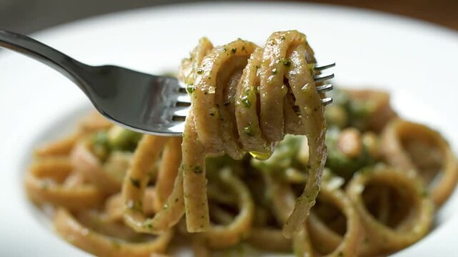 Delicious Whole Wheat Pasta Twirl on a Fork Close-Up