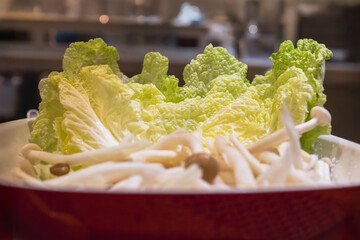 Fresh of napa lettuce or Chinese cabbage leave in a bowl.
