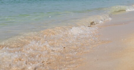 Sandy Beach Shoreline with Clear Turquoise Water and Blue Sky on a Sunny Day, Mediterranean Coast