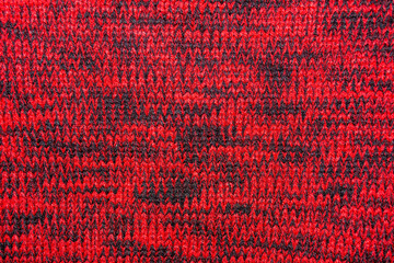 Textura o fondo de tejido de jersey rojo y negro