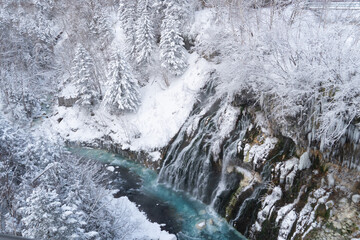 Shirahige waterfall or white beard waterfall in winter. Famous attractions in the shirogane hot spring area of Biei. Hokkaido, Japan.