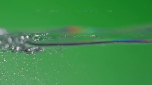 Distorted prisms in sunlit forest with light bending and distorting behind effect green screen glass refraction style featuring light