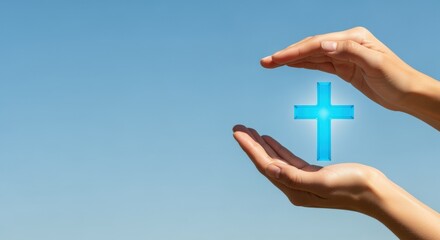 Hands Protecting a Glowing Christian Cross Symbol Against a Clear Blue Sky Background