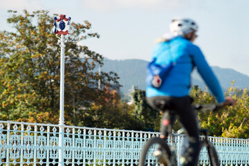 Pilgrims on International Bridge  Avenue on the Bidasoa river  that connects Hendaye with Irun on  Camino del Norte to Santiago de Compostela, Way St. James