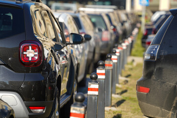 cars parked properly in a specially arranged space. public parking.