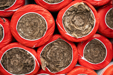 Rolls of thermal insulation material . Mineral wool  for roofing insulation . Texture background
