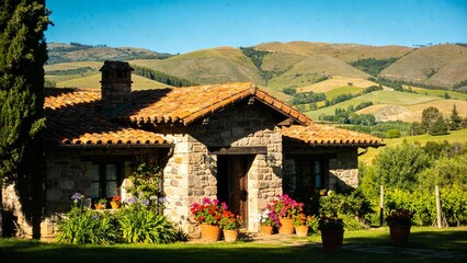 A simple house featuring a sloped roof against a clear blue sky