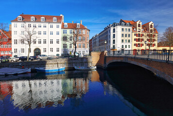 Copenhagen christianshavn canal with boats in old town. Famous tourist spot in Denmark with colorful historical buildings. Nyhavn Harbor