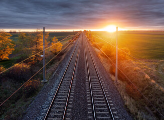 View of railroad tracks during sunset