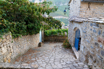 narrow street cobblestone alley in a southern french village