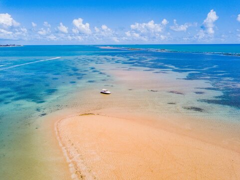 Ilha da Areia Vermelha, Cabedelo, Para&iacute;ba - aerial view of the island in the middle of the sea with tour boats