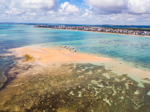 Ilha da Areia Vermelha, Cabedelo, Para&iacute;ba - aerial view of the island in the middle of the sea with tour boats