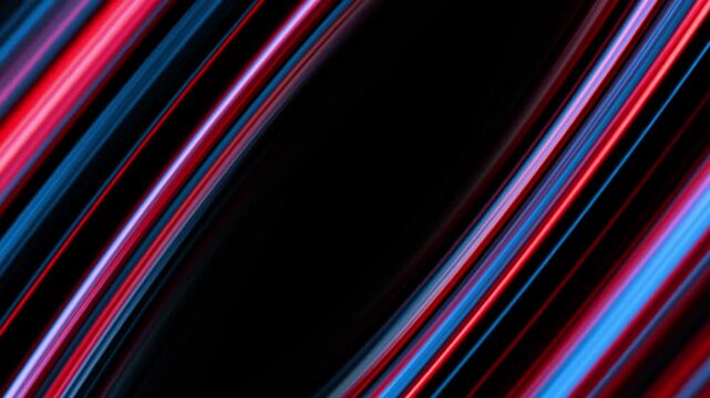 Vibrant diagonal neon stripes with glowing multicolor light trails streaming across a dark futuristic background, creating an energetic abstract motion design ideal for digital art, music videos, tech