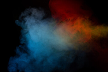 Obraz premium Blue and yellow steam on a black background.