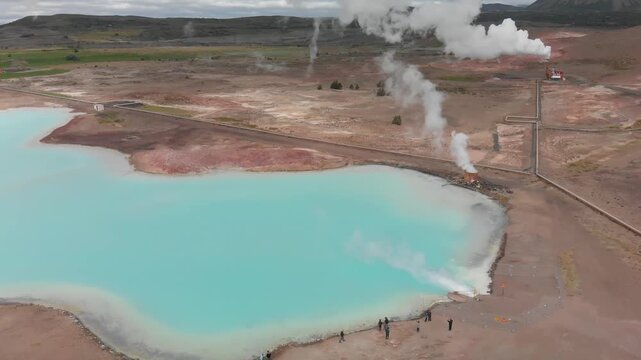 Hot geothermal pool of Hverir Myvatn Lake. Iceland blue water steam, aerial view