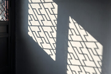 Silhouette with traditional Chinese pattern on the wall