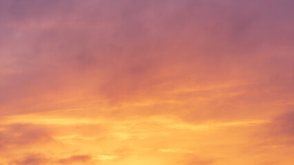 Soft Pastel Sunset or Sunrise Sky Background with Gentle Orange and Pink Hues