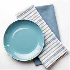white plate on blue tablecloth