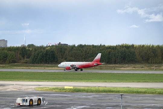 Saint-Petersburg, RUSSIA - September the 23th, 2025: Aircraft Airbus A319 of Russia Airlines is landing in Pulkovo airport runway side view
