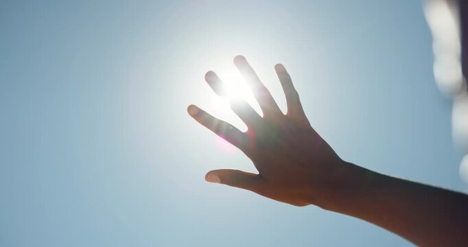 Blue sky, flare or hand of person with sunshine, block glare or shade eyes for protection from intense light. Vision support, uv rays or woman shield face to prevent sunburn, mockup space or outdoor