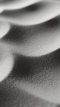 Elegant waves of shifting sand patterns creating abstract textures and shadows. Color Trend 2026. 