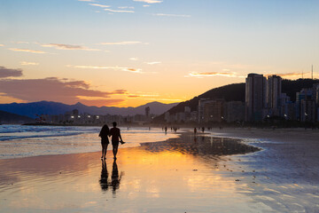 Romantic Sunset Walk on Gonzaga Beach in Santos, Brazil