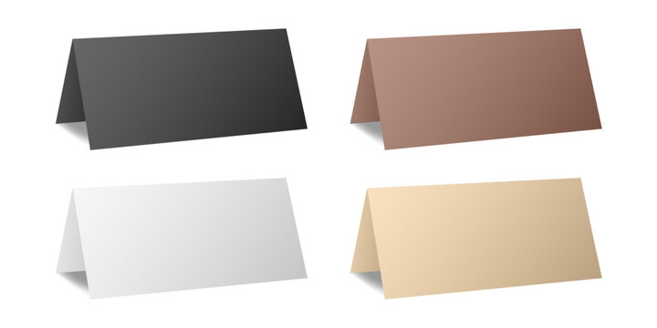 Set of table cards. White, black, beige, and brown bent sheets. Tent table card, nameplate