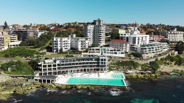 Aerial panoramic view of Bondi Beach pools and coastline on a beautiful winter day, Australia