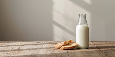 Milk and bread on a white table, breakfast nutrition for health awareness