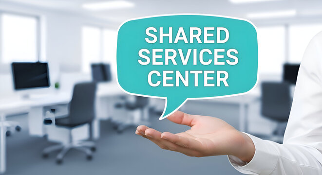 Professional hand presenting a bright teal speech bubble with the words shared services center concept over a blurred modern office background - Powered by Adobe