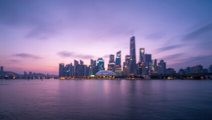 Naklejka premium Dusk cityscape with soft lights and bokeh, urban environment designed for editorial or graphic use