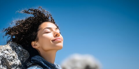 Woman enjoyment the wind and breathing air with breathing, meditating, woman, beach, wind, air, rock