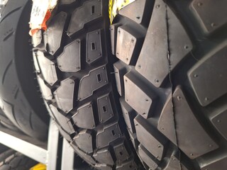 closeup of new tire grip pattern for trail bikes on display