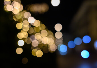 Blurry defocused lights in night time. Blurred background.
