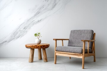 Wooden armchair and side table with plant against marbled wall.