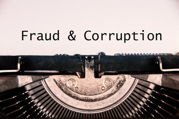 A title depicting a fraud and corruption policy heading typed on paper symbolizing organizational anti misconduct controls