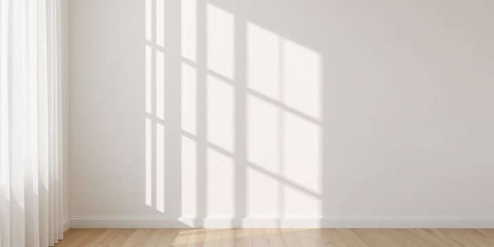 Light and shadows cast by curtains on a white wall, creating a calming background for text or design, ideal for editorial layouts