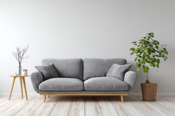 A modern living room features a gray sofa and wooden floor.